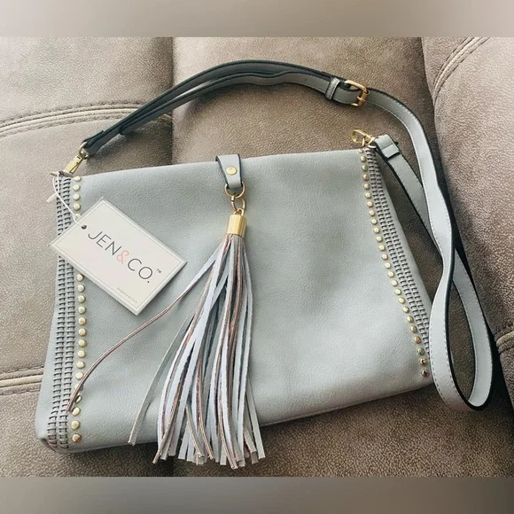 New Blue-Gray Marie - Grommet Detail Fold Over Tassel - Vegan Leather Crossbody - Picture 1 of 4